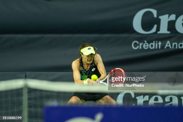 Alize Cornet of France is in action against Nuria Parrizas Diaz of Spain during the Round of 16 of the Creand Andorra Open Women's Tennis Association...