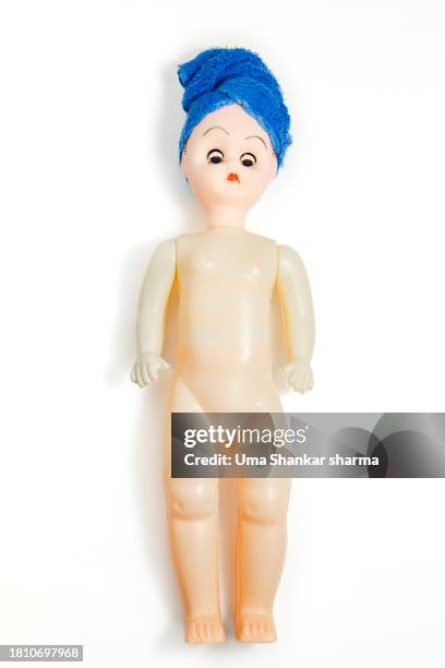 plastic doll without clothes on white background. - female likeness stock pictures, royalty-free photos & images