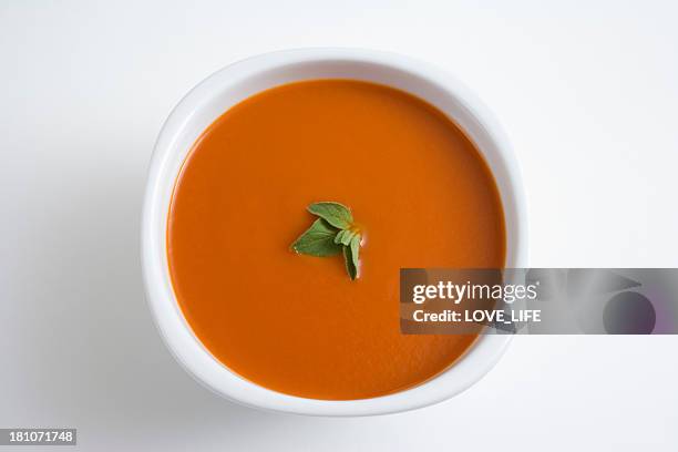 tomato soup - bowl of soup stockfoto's en -beelden