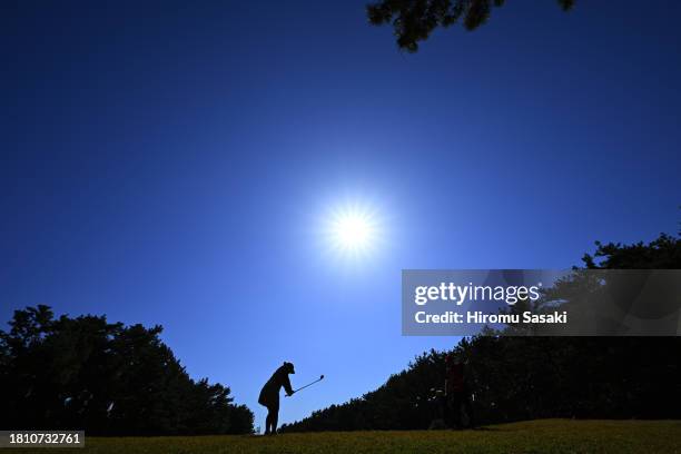 Ai Suzuki of Japan chips onto the 14th green during the second round of JLPGA Tour Championship Ricoh Cup at Miyazaki Country Club on November 24,...