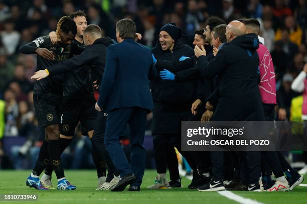 Napoli's players celebrate their second goal scored by Cameroon midfielder Andre Zambo Anguissa during the UEFA Champions League first round group C...