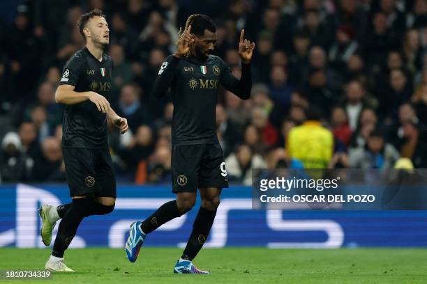 Napoli's Cameroon midfielder Andre Zambo Anguissa celebrates scoring his team's second goal during the UEFA Champions League first round group C...