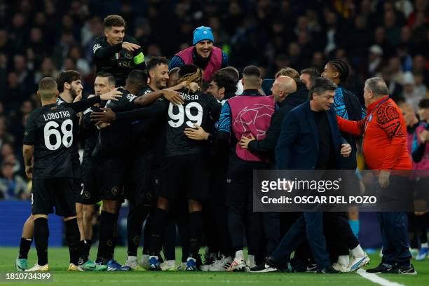 Napoli's players celebrate their second goal scored by Cameroon midfielder Andre Zambo Anguissa during the UEFA Champions League first round group C...