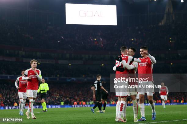 Arsenal's Italian midfielder Jorginho celebrates scoring his team's sixth goal during the UEFA Champions League Group B football match between...