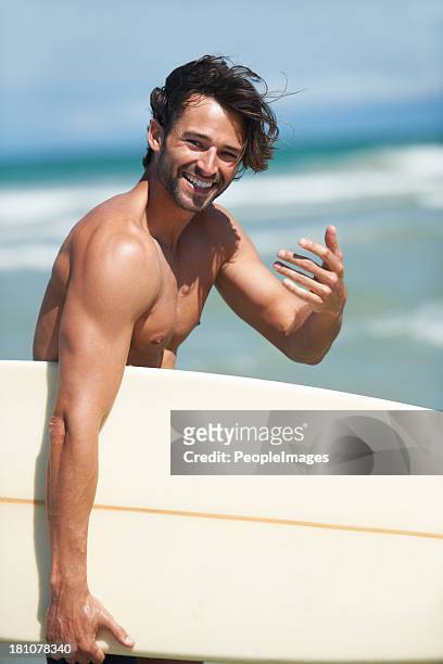 come on, join me! - hunky guy on beach stock pictures, royalty-free photos & images