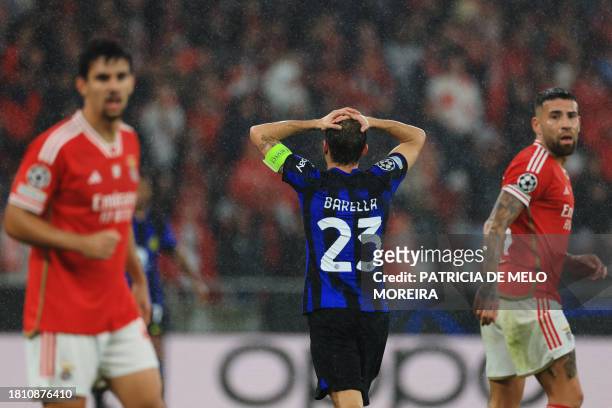 Inter Milan's Italian midfielder Nicolo Barella reacts during the UEFA Champions League first round group D football match between SL Benfica and FC...