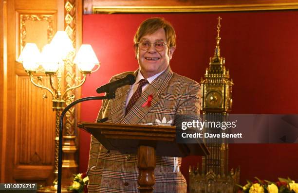 Sir Elton John speaks at a reception honouring Sir Elton John hosted by the All Party Parliamentary Group on HIV/AIDS at Speakers House in...