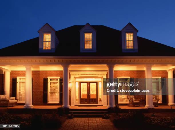 home at night - glowing doorway stock pictures, royalty-free photos & images