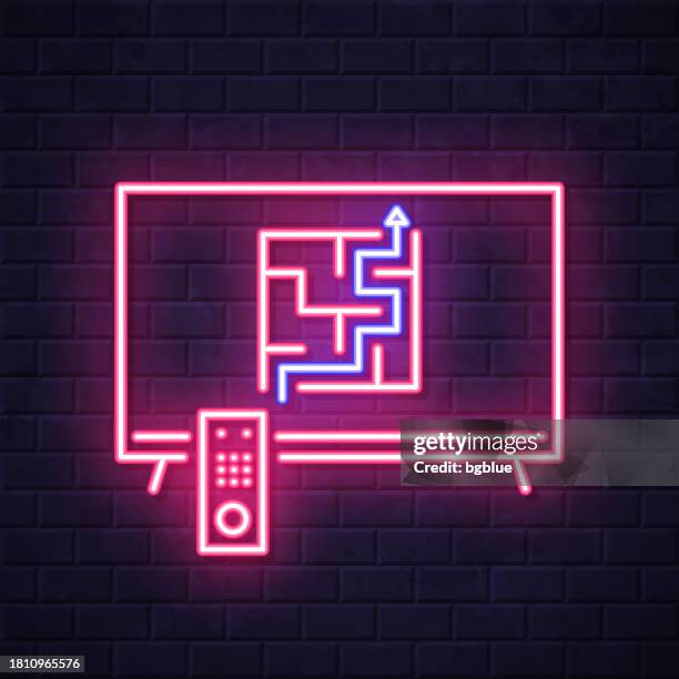 tv with maze. glowing neon icon on brick wall background - lighting path concept stock illustrations