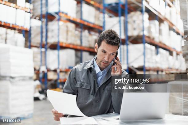 taking orders - busy warehouse stock pictures, royalty-free photos & images