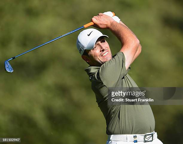 Francesco Molinari of Italy plays a shot during the first round of the Italian Open golf at Circolo Golf Torino on September 19, 2013 in Turin, Italy.