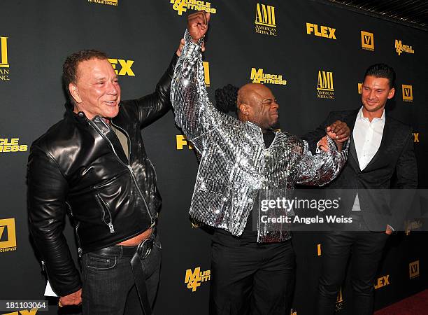Actor Mickey Rourke, bodybuilder Kai Green and director/producer Vlad Yudin arrive at the Los Angeles premiere of 'GENERATION IRON' at Chinese 6...