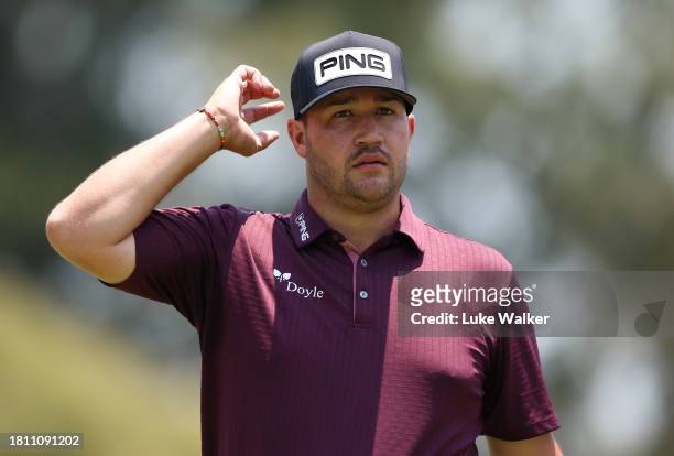 Thriston Lawrence of South Africa doffs his cap on the ninth hole during Day Two of the Joburg Open at Houghton GC on November 24, 2023 in...