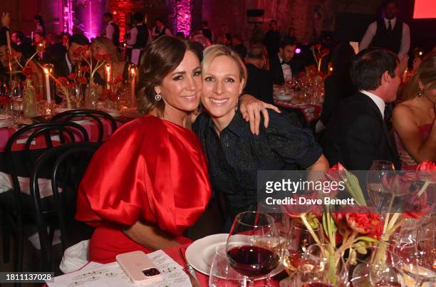 Natalie Pinkham and Zara Tindall attend The Anti Slavery Collective's inaugural Winter Gala at Battersea Arts Centre on November 29, 2023 in London,...