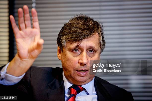 Jan Fischer, Czech Republic's finance minister, speaks during an interview in Prague, Czech Republic, on Thursday, Sept. 19, 2013. Czech deficit...