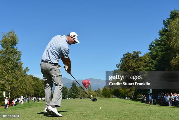 Nicolas Colsaerts of Belgium plays a shot during the first round of the Italian Open golf at Circolo Golf Torino on September 19, 2013 in Turin,...