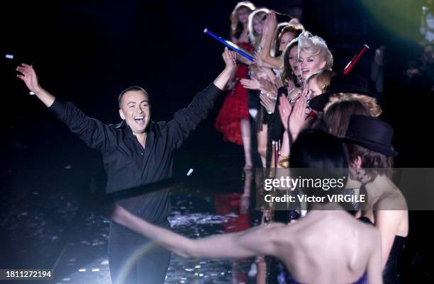 Fashion designer Julien Macdonald walks the runway during the Julien Macdonald Ready to Wear Fall/Winter 2002-2003 fashion show as part of the London...