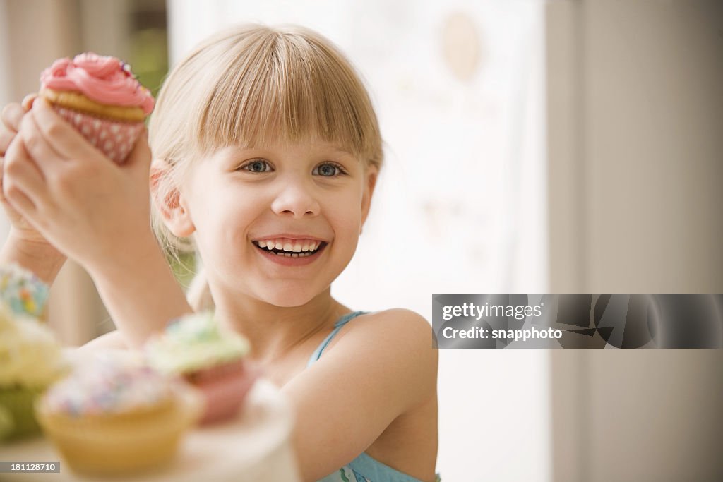 Child Eating Cupcake