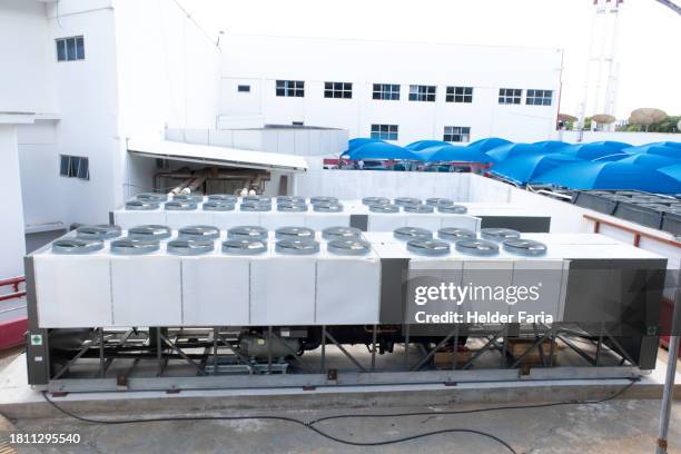 hvac chiller system (heating, ventilating and air conditioning) - condenser stock pictures, royalty-free photos & images