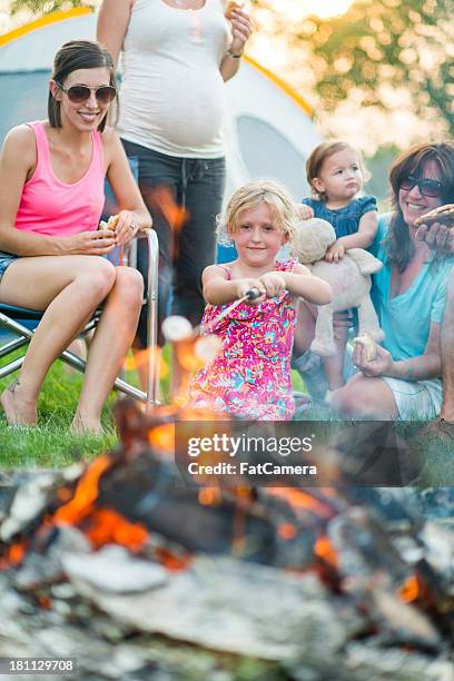 family campfire - marsh mallows stock pictures, royalty-free photos & images