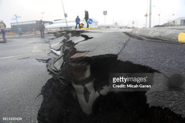 Street damaged from volcanic earthquakes is seen on November 22, 2023 in Grindavik, Iceland.