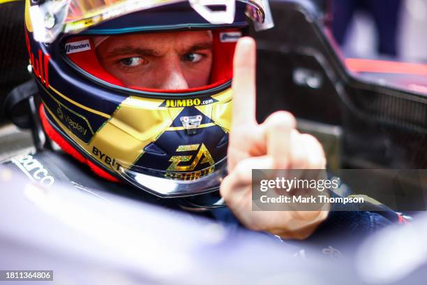 Max Verstappen of the Netherlands and Oracle Red Bull Racing prepares to drive in the garage during practice ahead of the F1 Grand Prix of Abu Dhabi...