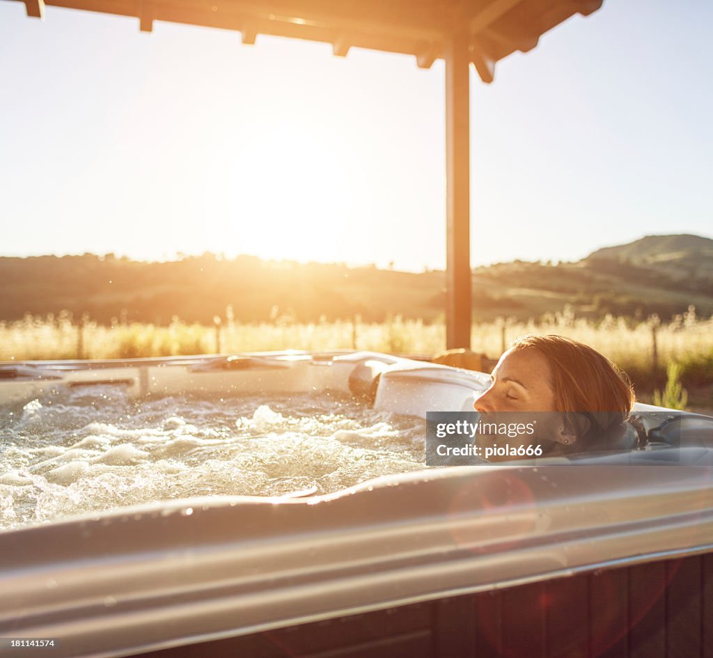 Woman in whirlpool hot tub