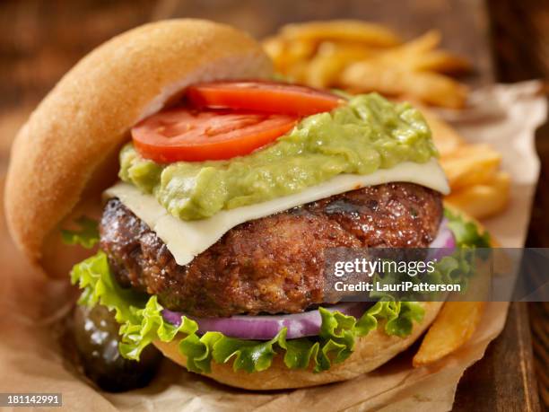 the guacamole bacon burger - guacamole stock pictures, royalty-free photos & images