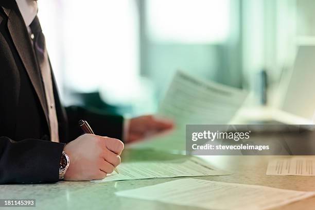 Black Hand Signing Paper Photos and Premium High Res Pictures - Getty ...