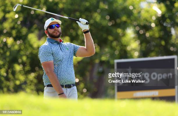 Dean Burmester of South Africa plays his tee shot on the 16th hole during Day Two of the Joburg Open at Houghton GC on November 24, 2023 in...