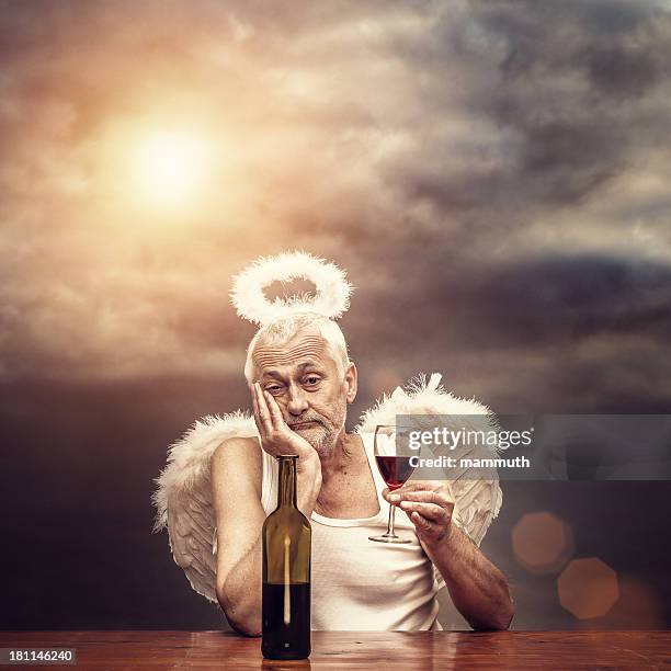 drunken angel - dark angel stock pictures, royalty-free photos & images