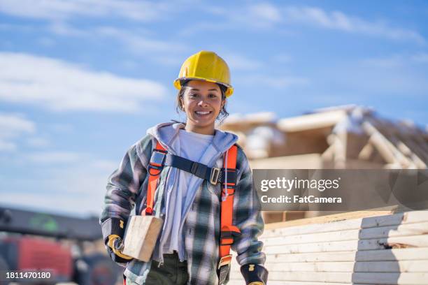 female construction worker portrait - female bricklayer stock pictures, royalty-free photos & images