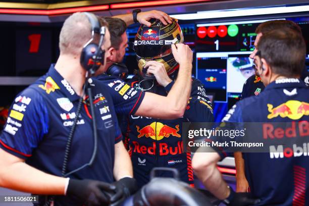 Max Verstappen of the Netherlands and Oracle Red Bull Racing prepares to drive in the garage during practice ahead of the F1 Grand Prix of Abu Dhabi...