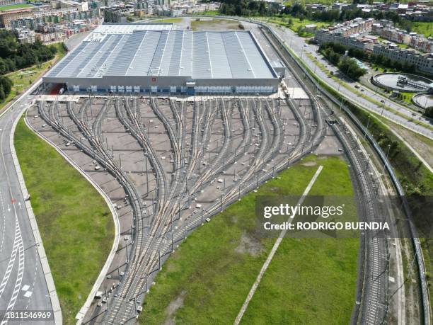 Aerial view of the railway tracks leading to the garage and maintenance and repair facility of Quito's Metro Line 1 near the southermost subway...