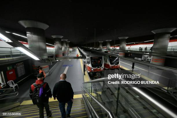 Two trains remain parked at Quito's Metro Line 1 southermost subway station, Quitumbe, in Quito, on November 28, 2023. After a decade of work and...