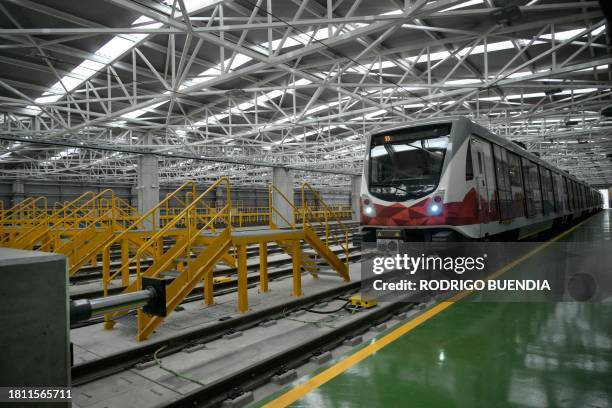 Train of Quito's Metro arrives at the garage near the Line 1 southermost subway station, Quitumbe, in Quito, during testing and fine-tuning of the...