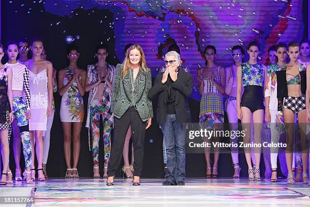 Italian designers Roberto Cavalli and wife Eva Düringer acknowledge the applause of the audience after the Just Cavalli show as a part of Milan...