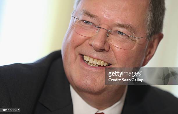 German Social Democrats chancellor candidate Peer Steinbrueck arrives shortly before attending an SPD election rally to meet with writers who had...