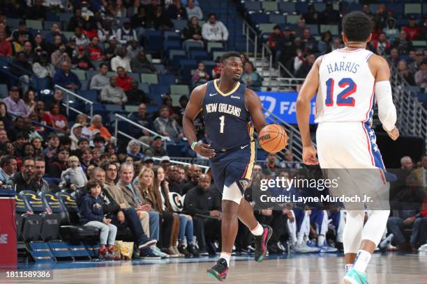Zion Williamson of the New Orleans Pelicans dribbles the ball during the game against the Philadelphia 76ers on November 29, 2023 at the Smoothie...