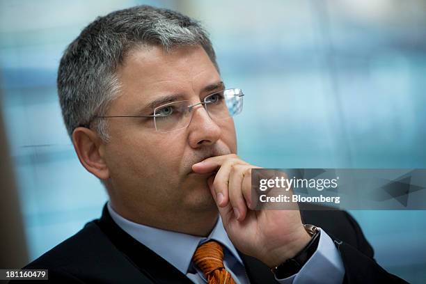 Severin Schwan, chief executive officer Roche Holding AG, listens during an interview in New York, U.S., on Thursday, Sept. 19, 2013. Roche Holding...