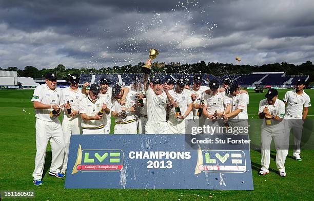 Durham captain Paul Collingwood and team celebrate with the trophy after winning the LV County Championship Division One title after day three of the...