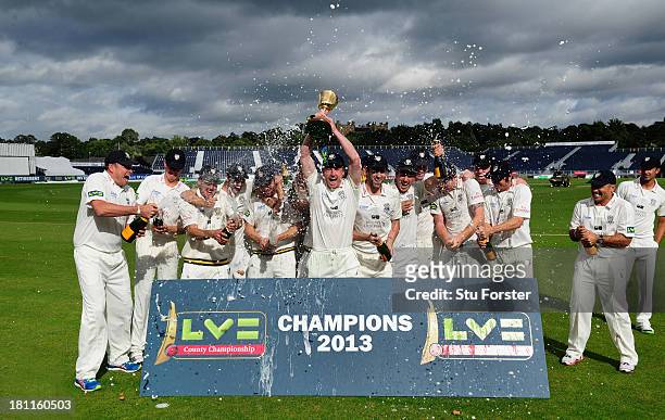 Durham captain Paul Collingwood and team celebrate with the trophy after winning the LV County Championship Division One title after day three of the...