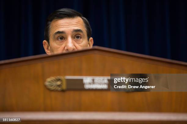 Committee Chairman Darrell Issa listens to testimony during a House Oversight Committee hearing entitled 'Reviews of the Benghazi Attack and...