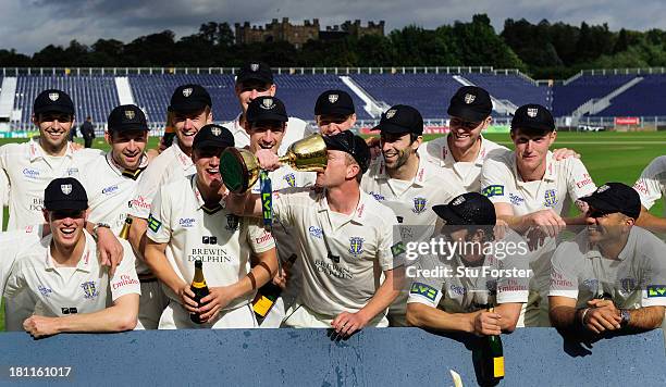 Durham captain Paul Collingwood and team celebrate with the trophy after winning the LV County Championship Division One title after day three of the...