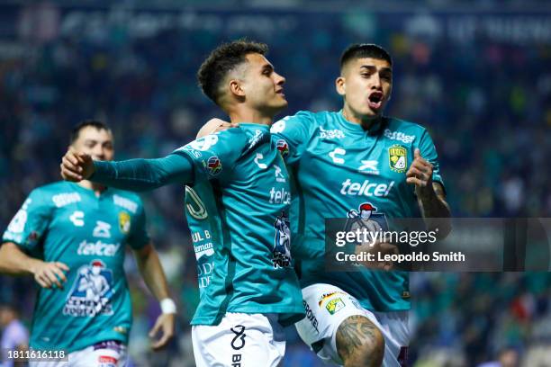 Paul Bellon of Leon celebrates after scoring the team's first goal with his teammate Adonis Frias during the quarterfinals first leg match between...