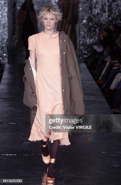 Model walks the runway during the Paul Smith Ready to Wear Fall/Winter 2002-2003 fashion show as part of the London Fashion Week on February 18, 2002...