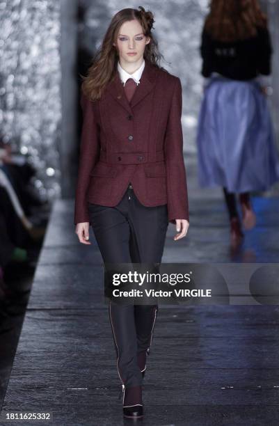 Model walks the runway during the Paul Smith Ready to Wear Fall/Winter 2002-2003 fashion show as part of the London Fashion Week on February 18, 2002...