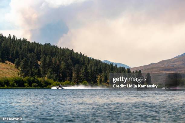 fire bosses fill on pearrygin lake - methow valley stock pictures, royalty-free photos & images