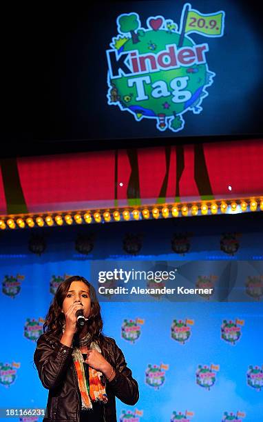 Michele, winner of the 2013 TV show «The Voice Kids«, performs during the Ferrero kinderTag 2013 event at Heidepark on September 19, 2013 in Soltau,...