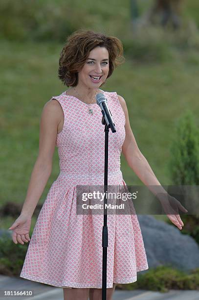 Isabel Varell performs during the recording of the TV Show 'ZDF Fernsehgarten' at Seiser Alm near Kastelruth on September 18, 2013 in Kastelruth,...